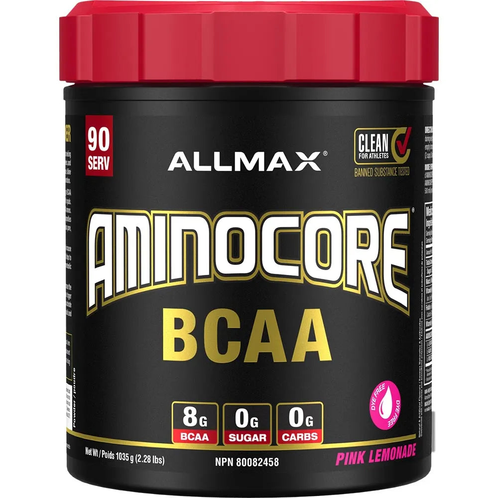 A tub of Allmax Aminocore BCAA dietary supplement in Pink Lemonade flavor, featuring a black container with a red lid and white and gold lettering.