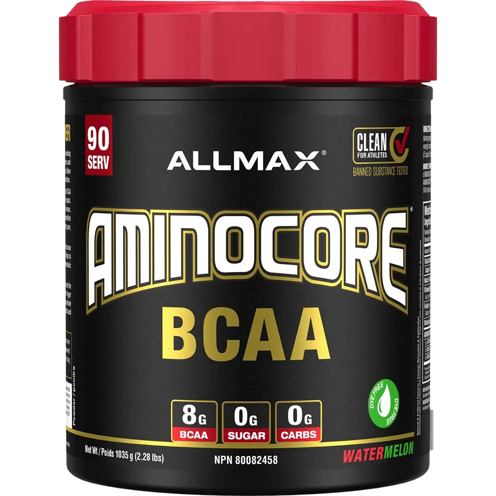 A tub of Allmax Aminocore BCAA supplement powder in Watermelon flavor, featuring a black container with a red lid and white and gold lettering.