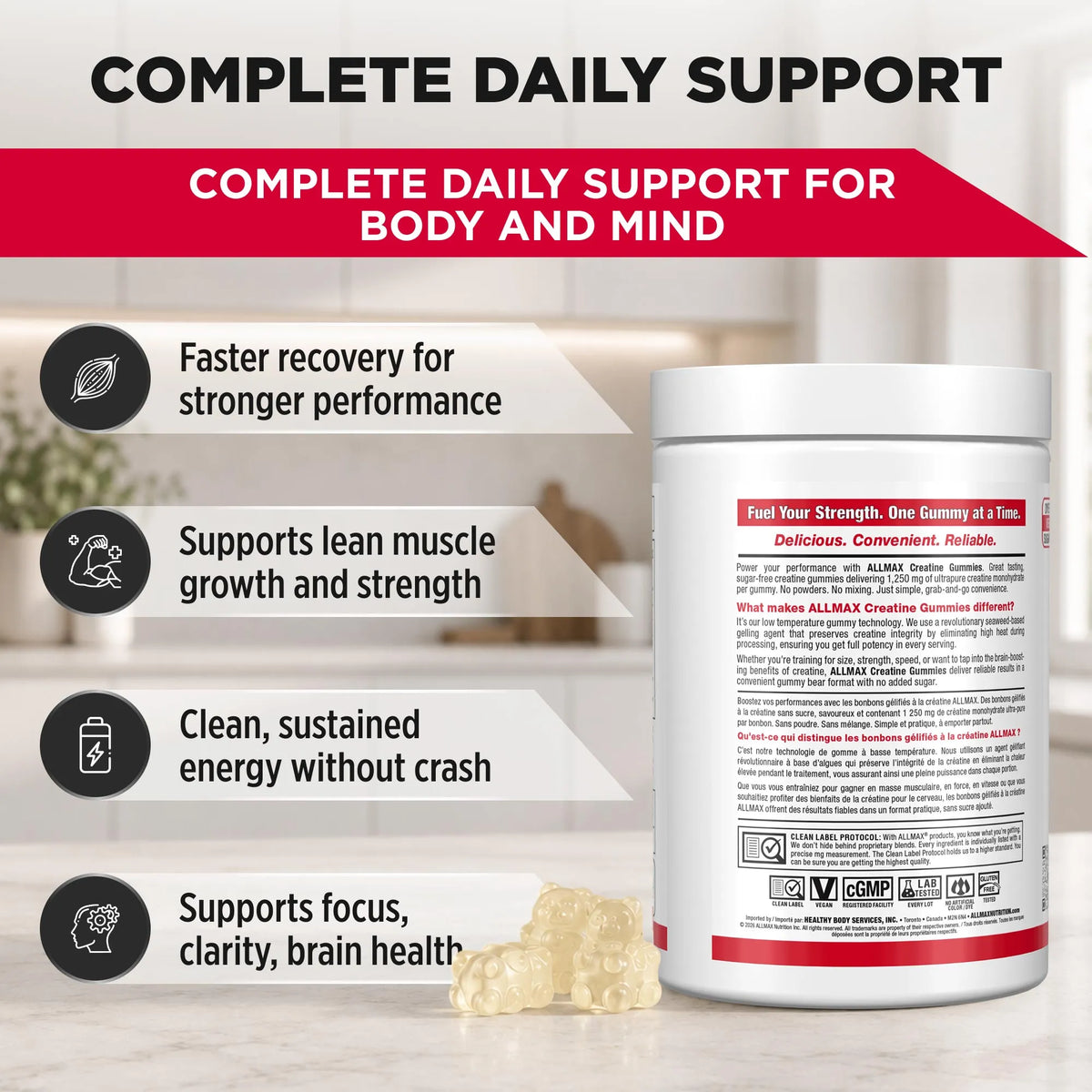 A white bottle of ALLMAX Complete Daily Support gummies with a few translucent gummy bears in front, set against a blurred kitchen background. The image features marketing text and icons highlighting benefits like faster recovery, lean muscle growth, sustained energy, and focus support.